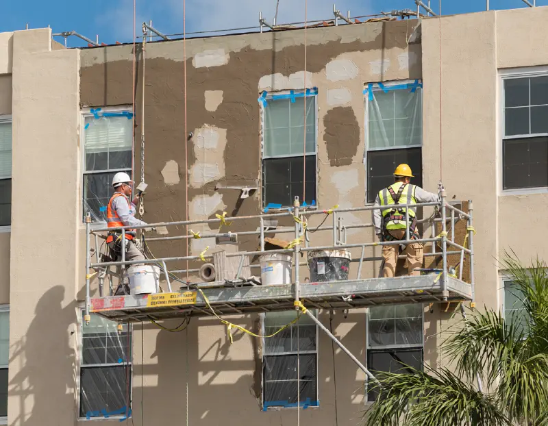 Stucco repair on a Florida office building exterior